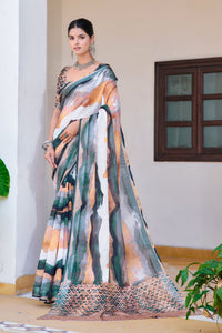 Soft linen cotton saree with digital print and silver patti border.