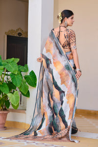 Soft linen cotton saree with digital print and silver patti border.