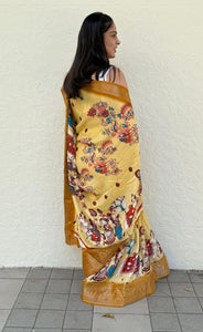 soft dola silk saree with all over zari lining and jacquard border .