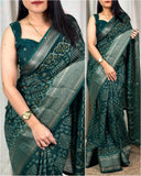 printed muslin cotton saree with zari boder & tussles in pallu - Saree