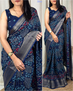 printed muslin cotton saree with zari boder & tussles in pallu - Saree