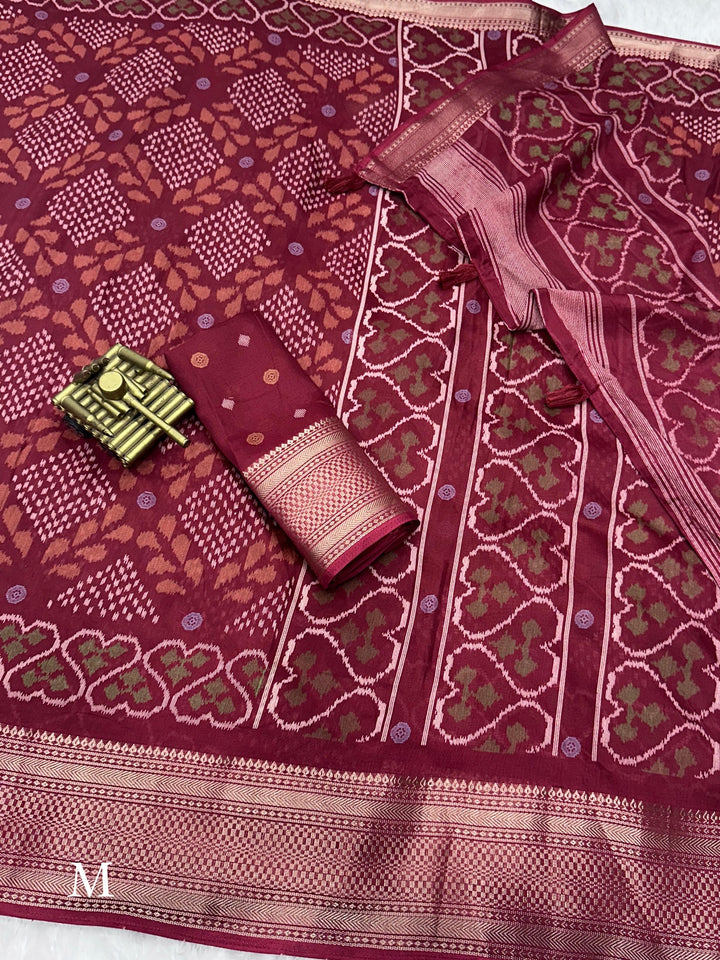 printed muslin cotton saree with zari boder & tussles in pallu