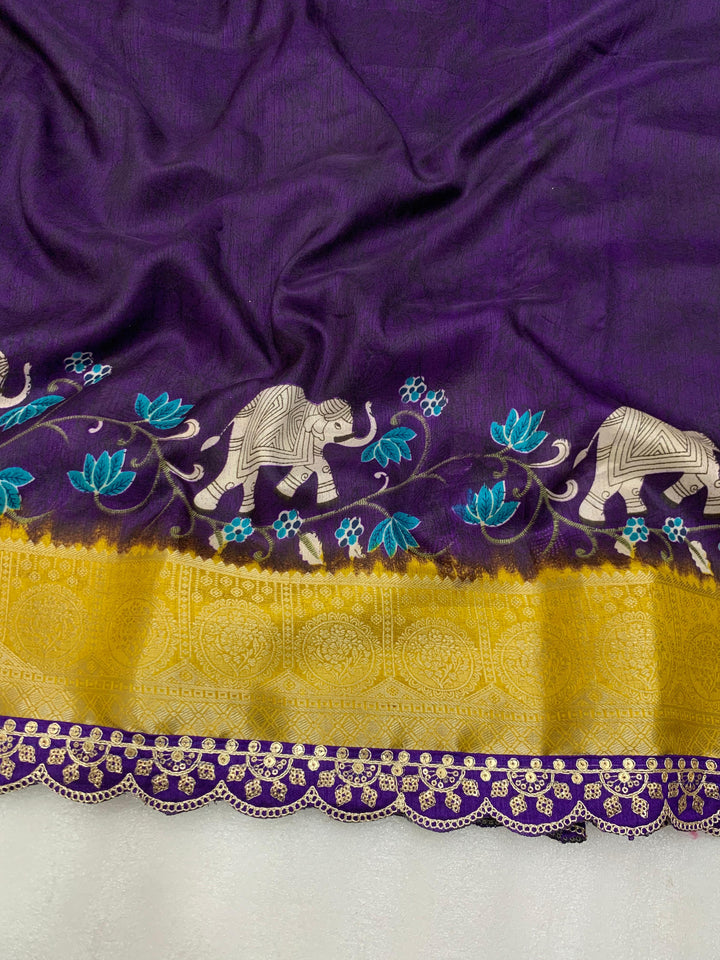 Beautiful Benny crape saree with all over kalamkari design along with scallop maggam work lace at border